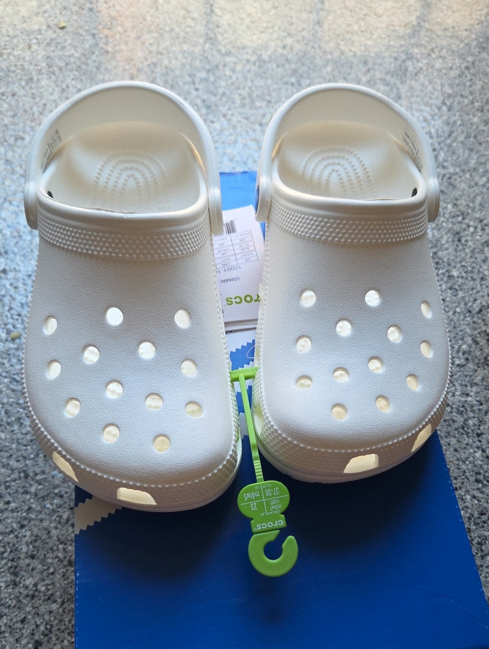 White CROCS in White - Women's 7/Men's 5